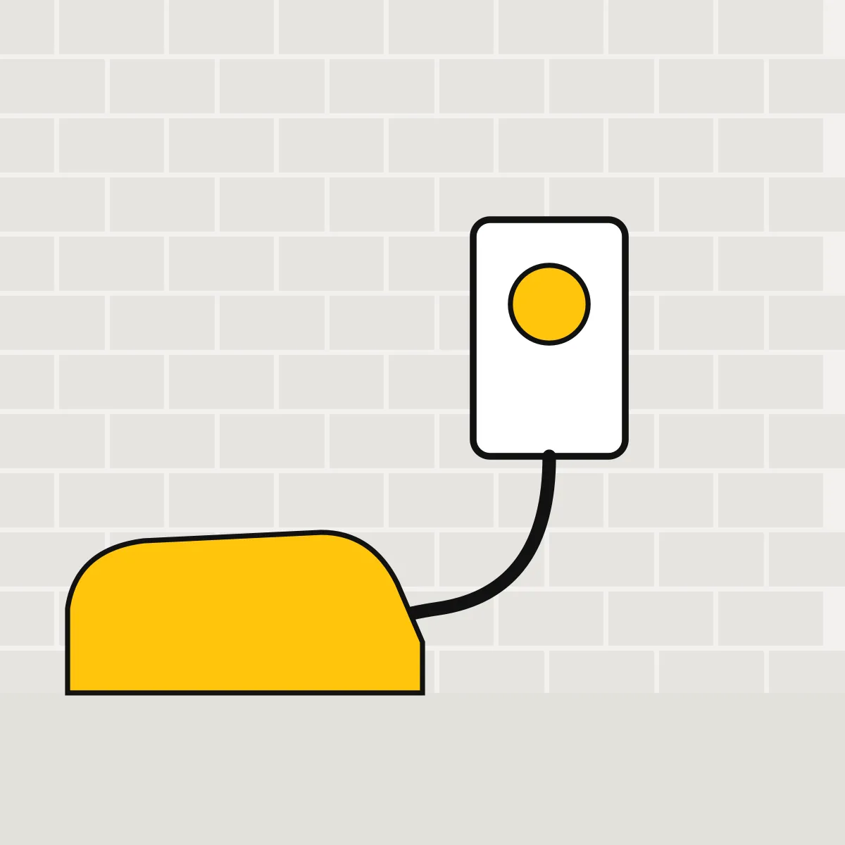 Wall-mounted EV charger on a house front