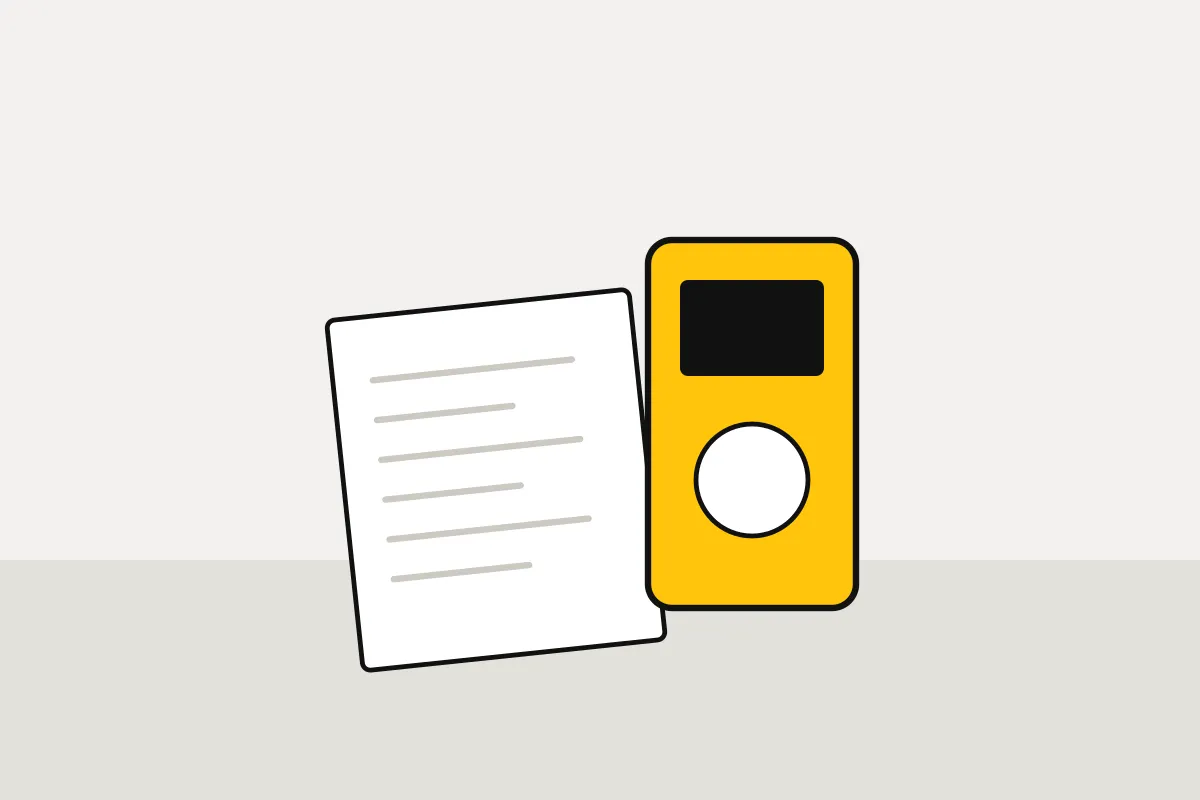 Electrical test meter beside a certificate